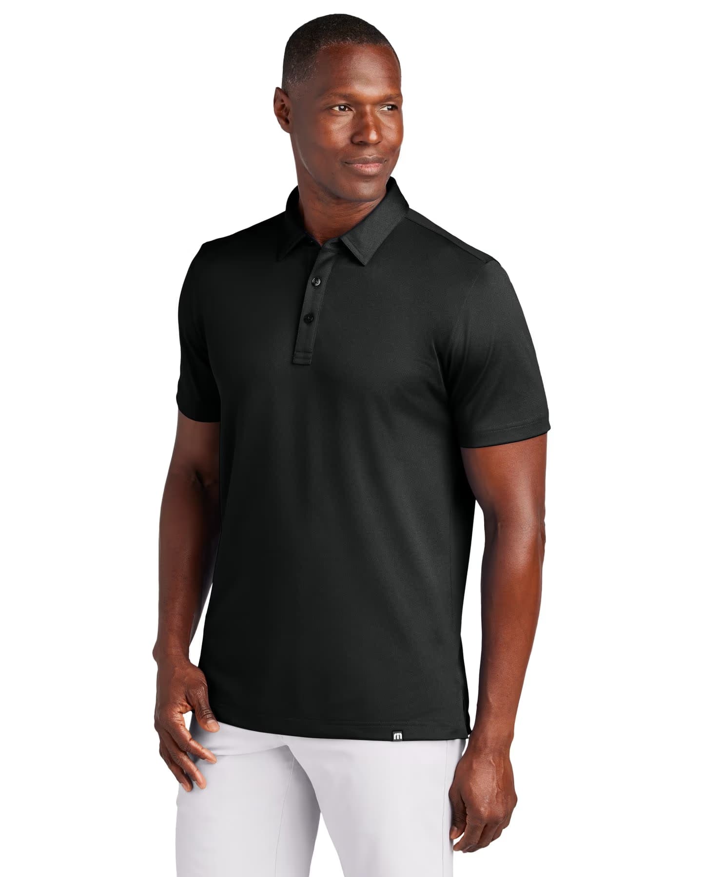 TravisMathew Cabana Solid Polo - Black front